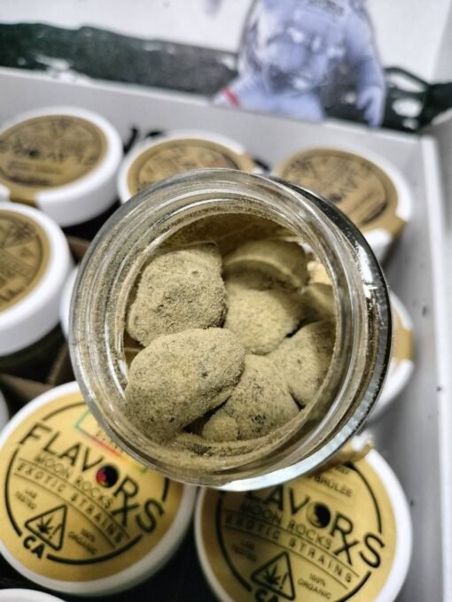 Flavorxs Premium moon rocks for sale online Flavors Moon rocks, sometimes referred to as cannabis caviar or infused flower, are a highly potent mixture of marijuana flower, concentrate, and kief. The Flavorxs moon rocks gets its moniker because of its astronomical THC levels—the psychoactive effects have some cannabis enthusiasts feeling like they’re walking on the moon. Recently, Moon Rock products have started to expand into new avenues. For instance, some cannabis companies have created moon rocks that are THC free and have a high CBD content. Others cater to people who prefer to shop for pre-rolls designed to emulate the moon rock experience. They’re created by coating a finished pre-roll in concentrate and rolling it in kief. This allows you to experience Moon Rocks without having to make them yourself and deal with the mess. What Are Flavorxs Rocks Made Of? Making Flavorxs moon rocks are easier to make than you might think. You take a strain of marijuana flower—often Girl Scout Cookies—and coat it with a concentrate. The easiest concentrate to use is hash oil, though it truly depends on your own preferences. Once the flower is covered in concentrate, you roll it in kief, the dried trichomes from the cannabis flower. This process ensures you are adding the potency of the original flower to both the concentrate’s and kief’s potencies. How Do You Smoke Flavorxs MoonRocks? Flavorxs Moon rocks are usually quite sticky so you have to adjust your smoking process a little to avoid making a mess and ruining your valuable cannabis. To start, you’re going to want to use scissors instead of a grinder to break your Flavorxs moon rocks into more consumable pieces. Then, grab a glass hand pipe or water pipe. (Whatever you do, don’t try to roll Flavorxs premium moon rocks into rolling papers for a “joint” or blunt.) Now, take your smaller pieces of Flavorxs moon rocks and gently place them into the bowl of the pipe. You don’t want to pack it too tightly. If you really want to get fancy, add a hemp wick too. This will keep you from having to hold the flame to your pipe for long periods of time and inhale the fumes. Now, just smoke as you would normally. How to Make Flavorxs premium Moon Rocks at Home Anyone can make moon rocks, as long as you have the right materials. For example, if you have a favorite strain and a favorite extract, these can be great combinations for creating moon rocks. You can purchase kief or collect it with a grinder, and you simply roll your concentrate-coated nug in the kief. From there, you can smoke or vape your moon rocks. If you’re not really interested in making your own moon rocks, don’t worry. We sell pre-made Flavorxs rocks moon rocks to make it easy to experience them without having to get your fingers sticky making them. Answering FAQs About THC Moon Rocks Moon rocks are one of those fun, fascinating cannabis products that people learn about as they get deeper into the industry. So it stands to reason we get a lot of questions about them. Here are some of our most frequently asked and answered questions: What is in Flavorxs moonrocks? There are three ingredients in cannabis moon rocks: marijuana flower, a concentrate of some kind, and kief. The potency of moon rocks depends entirely on the strain of flower and the potency of your concentrate. In general, moon rocks are considered to be extremely potent. How potent are Flavorxs moonrocks? The THC levels in Flavorxs moon rocks typically reach at least 50%, though they can go much, much higher depending on the strain, the concentrate, and the kief. Buying Flavorxs premium MoonRocks If you want to try Flavorxs moon rocks, you have two options. You can purchase them ready-made off the shelf, or you can purchase the materials you need to make them. While making them yourself allows for a much more customized experience, purchasing them can be a great, budget-friendly option for people who aren’t sure they want to invest into Flavorxs moonrocks until they’re sure they like them. Whichever option you choose, next time you’re visiting a dispensary, ask for help from one of our expert budtenders. They’ll help you find moon rocks or get the materials you need to make them yourself.